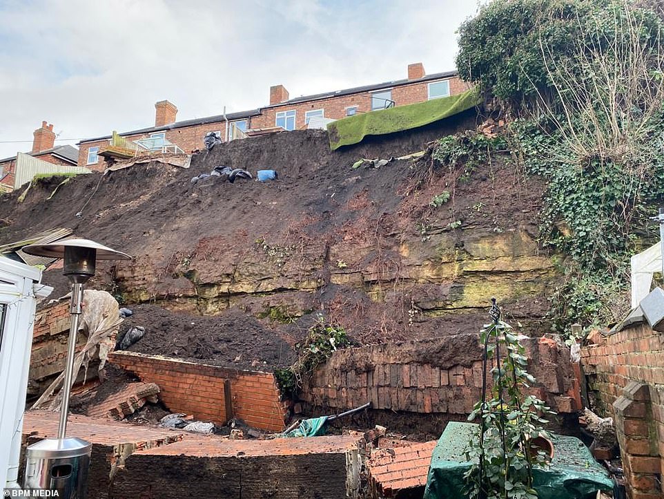 News: Families are evacuated as landslide destroys 70ft-high wall