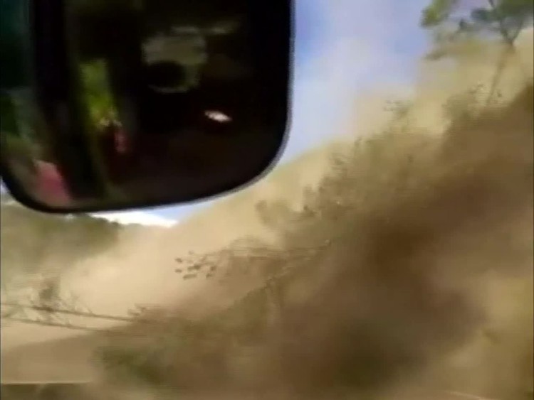 News: Philippines landslide inches from bus in near miss