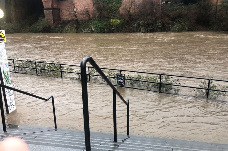 News: Water ‘shin-high’ after River Irwell burst its banks in Manchester city centre