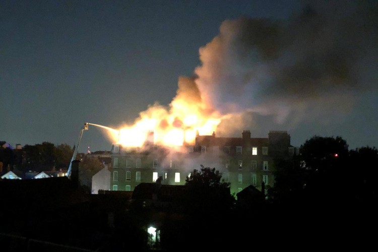 News: 100 firefighters tackle large blaze at flats in north-west London