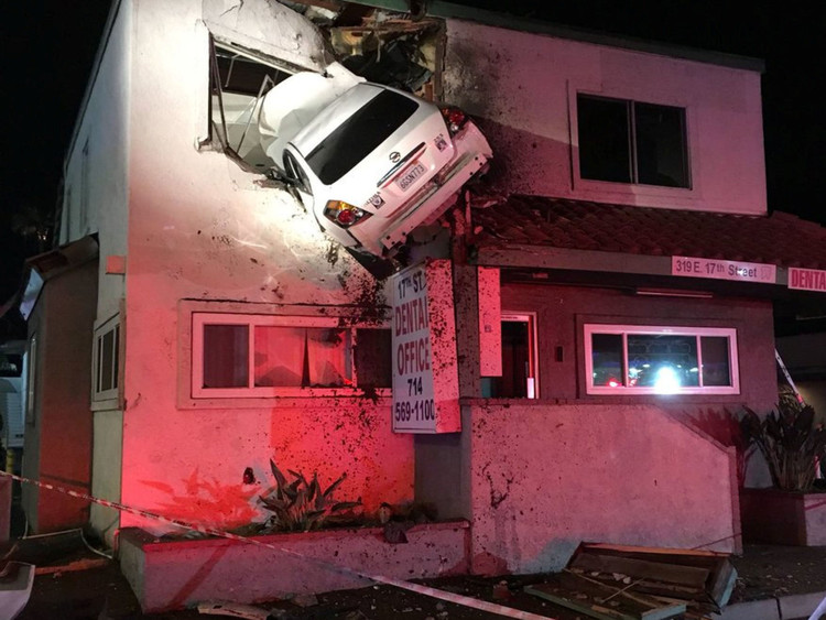 News: Car flies into the air and becomes wedged in dental office in California