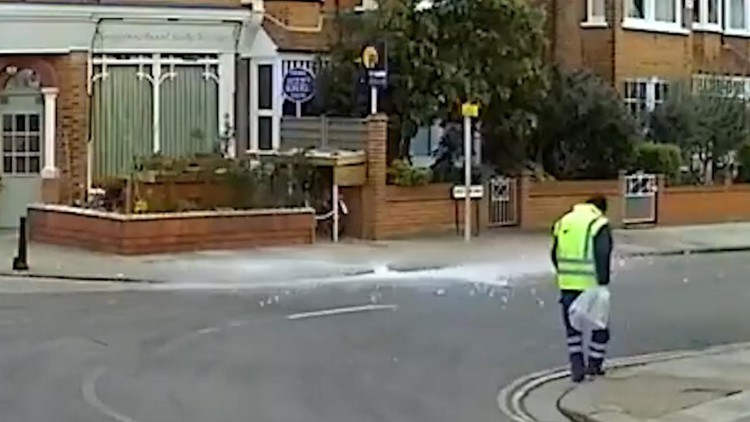 News: Block of ice almost hits London street cleaner