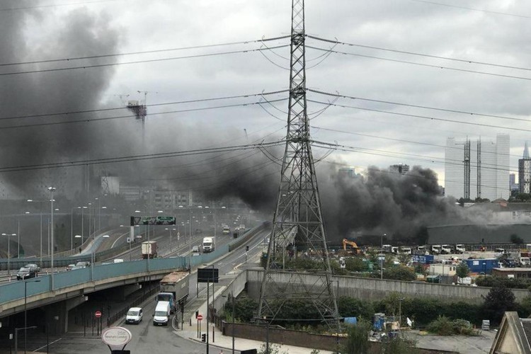 News: Canning town fire: Smoke visible for miles as 60 firefighters tackle huge blaze on industrial estate