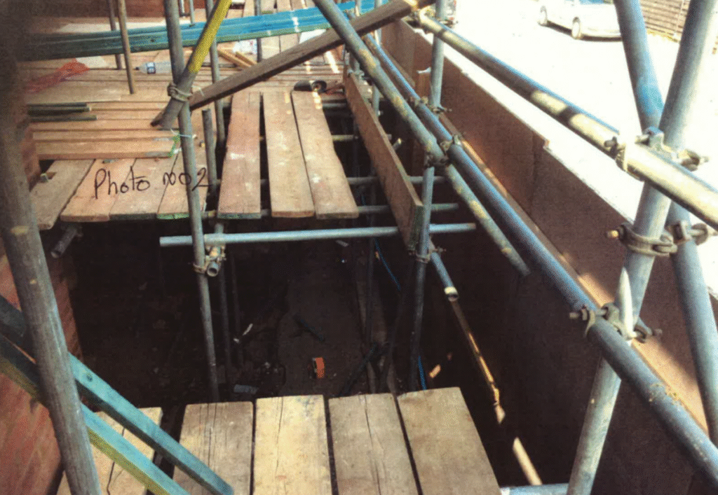 News: Worker dies in fall through unguarded gap in scaffold