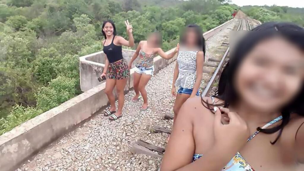News: Teenage girls take selfie on bridge moments before it collapses and they plummet 30ft to the ground below