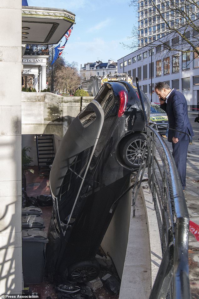 News: Mercedes driver wedges car in basement after crash